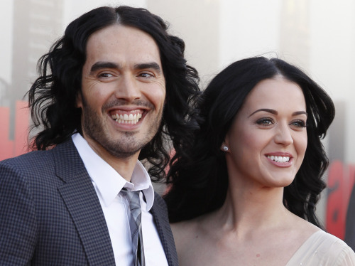British actor Russell Brand and his wife Katy Perry arrive for the European premiere of “Arthur,” in London in April. (AP-Yonhap News)