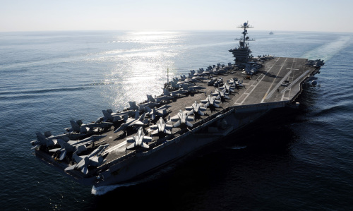 In this Nov. 12, 2011photo provided by the U.S. Navy, the Nimitz-class aircraft carrier USS John C. Stennis (CVN 74) transits the Straits of Hormuz. The Pentagon on Tuesday, Jan. 3, 2012 answered an Iranian warning to keep U.S. aircraft carriers out of the Persian Gulf by declaring that American warships will continue regularly scheduled deployments to the strategic waterway. The Navy has said the Stennis and another vessel exited the Gulf through the Strait of Hormuz a week ago, after operating in the area. (AP-Yonhap News)