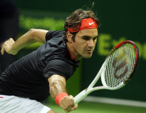 Roger Federer returns a shot against Grega Zemlja. (AP-Yonhap News)