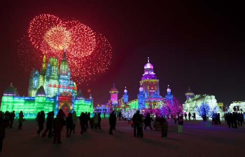 Visitors watch fireworks during the opening ceremony of the Harbin International Ice and Snow festival in Harbin in northeastern's China's Heilongjiang province, Thursday, Jan. 5, 2012. (AP)