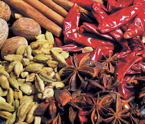 Spices can dress up a hot, frothy winter drink. Grated cinnamon, chile peppers, whole anise and other spices can create a complex flavor when combined with whiskey or vodka. (Tacoma News Tribune/MCT)