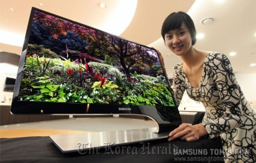 Samsung Electronics unveils its 3-D LED TV which will be made public during the 2012 International CES that opens in Las Vegas on Tuesday. (Samsung Electronics)