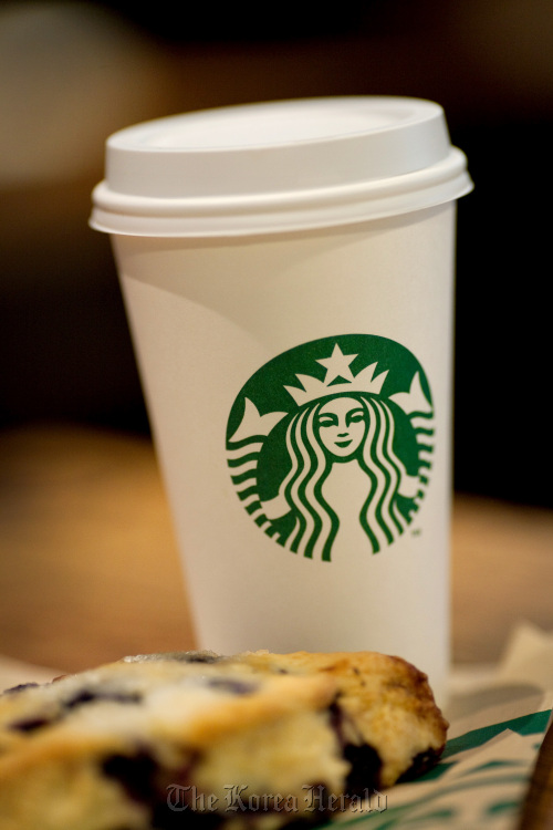 A large coffee sits on a table at a Starbucks coffee shop in Florham Park, New Jersey. (Bloomberg)