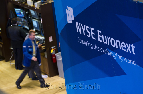 Traders work on the floor of the New York Stock Exchange in New York. (Bloomberg)