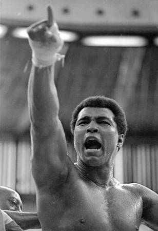 In this June 15, 1975, file photo, world heavyweight champion Muhammad Ali shouts 