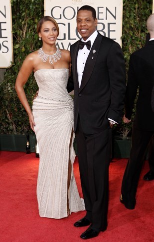 In this Jan. 11, 2009 file photo, Beyonce, left, is joined by husband Jay-Z, as she arrives at the 66th Annual Golden Globe Awards in Beverly Hills, California (AP)