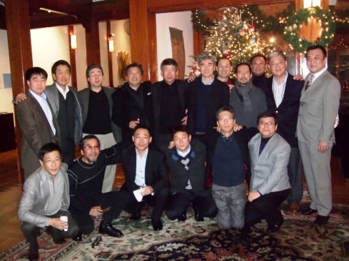 Ambassador Sung Kim (back row, center) enjoys a reunion with elementary school friends at his residence in Seoul. (U.S. Embassy)