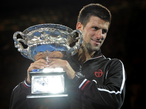 Novak Djokovic of Serbia poses with the Australian Open trophy. (AP-Yonhap News)