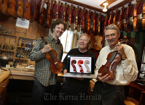 Violins were duplicated from the priceless Betts Stradivarius violin by using CT scans and a CNC machine. The team that did the work are from the left, Steven Rossow, Steve Sirr and John Waddle in Waddle’s violin shop in St. Paul, Minnesota, Jan. 13. (Minneapolis Star Tribune/MCT)