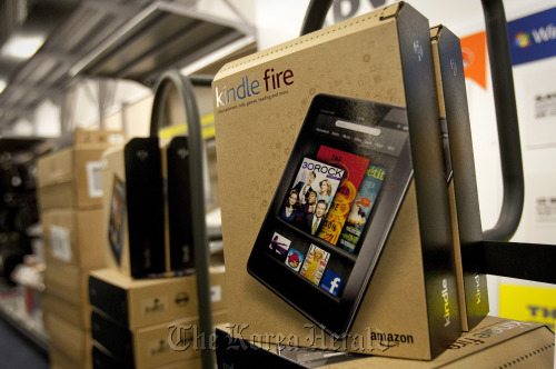 Boxes of the Amazon.com Inc. Kindle Fire tablet computer are stacked for purchase at a Best Buy Co. store in New York. (Bloomberg)