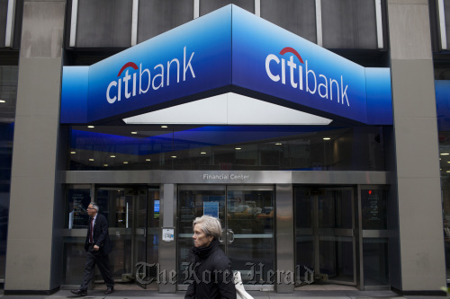 Pedestrians walk past Citigroup Inc. offices in New York. (Bloomberg)