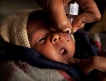 A newborn baby is being given a medication. (AP)