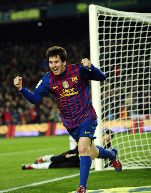 Barcelona’s Lionel Messi celebrates his goal against Valencia. (AP-Yonhap News)