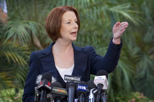 Australian Prime Minister Julia Gillard addresses the media outside State Parliament in Adelaide on Thursday. Prime Minister Gillard on February 23 called a ballot on the leadership of the ruling Labor party, bringing to a head an increasingly bitter and ugly row with predecessor Kevin Rudd and saying a vote would be held on Feb. 27 when parliament resumes. (AFP-Yonhap News)