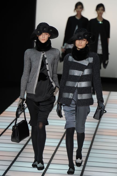 Models display creations as part of the Emporio Armani fall-winter 2012-2013 collection on Saturday during women’s fashion week in Milan. (AFP-Yonhap News)