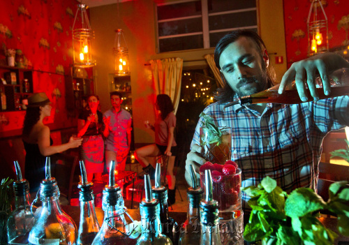 Co-Owner Elad Zvi mixes a high end cocktail on Feb. 6 at the Broken Shaker, a pop-up bar that just opened at the Indian Creek Hotel on Miami Beach, Florida. (Miami Herald/MCT)