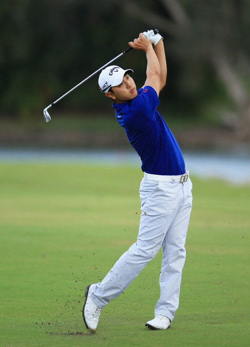 Korea’s Bae Sang-moon plays his second shot on the 14th hole on Thursday.(AFP-Yonhap News)