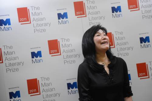 South Korean author Shin Kyung-sook laughs after winning the Man Asian Literary Prize for her book “Please Look After Mom” in Hong Kong on Mar. 15. (AFP)