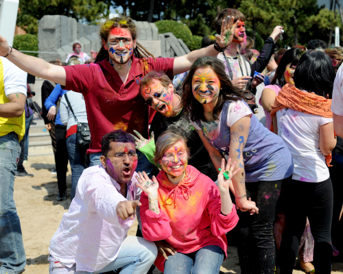 Expats join in the Holi celebrations at Haeundae Beach in Busan. (Sampa Guhamajumdar)