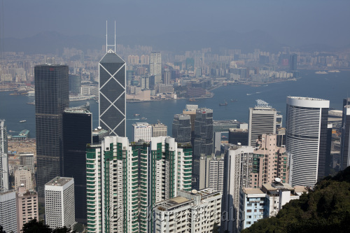 Commercial buildings rise above the business district of Central in Hong Kong. (Bloomberg)