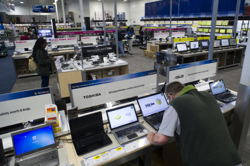 Customers browse computers and tablets at a Best Buy Co. store in Emeryville, California. (Bloomberg)