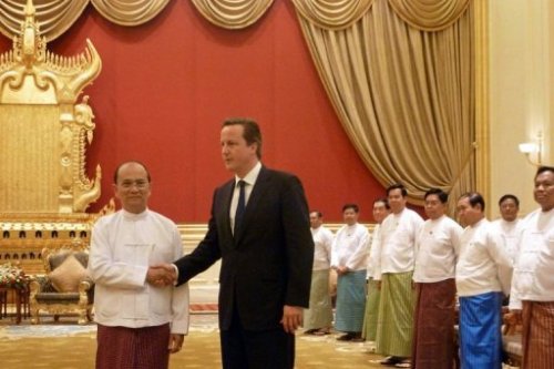 British Prime Minister David Cameron shakes hands with Myanmar`s President Thein Sein at the president`s official residence in Naypyidaw. (AFP)