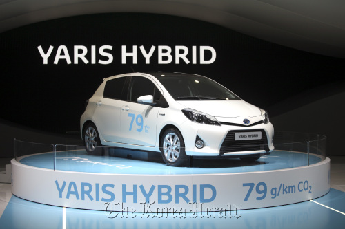 A Toyota Yaris Hybrid sits on display during the Geneva International Motor Show in Switzerland. (Bloomberg)