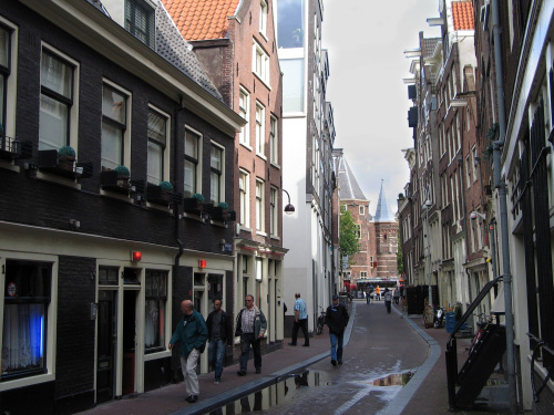 On the winding streets of Amsterdam's Red Light district, the red lights above the doors mean Amsterdam's prostitutes are open for business, legally. (MCT)