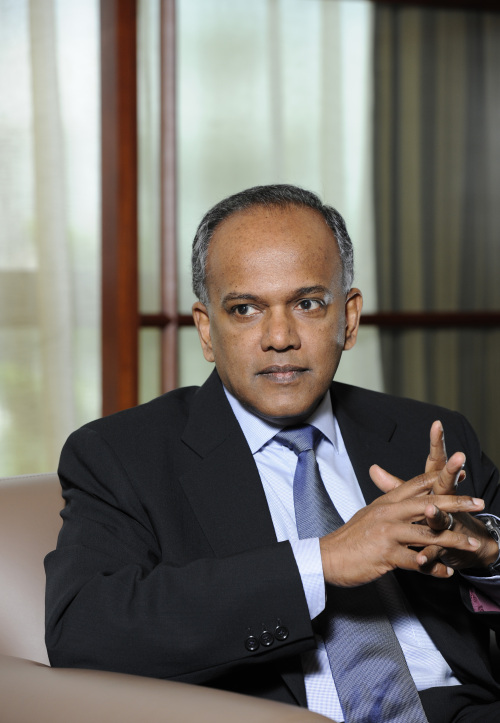 Kasiviswanathan Shanmugam, Singapore’s minister of law and foreign affairs, listens during an interview in Singapore on Monday. Singapore praised the U.S., the European Union and Australia for moving to ease sanctions against Myanmar. (Bloomberg-Yonhap News)