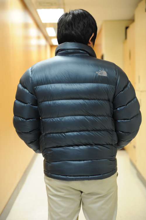 A man wears a jacket made by The North Face (Herald Business)