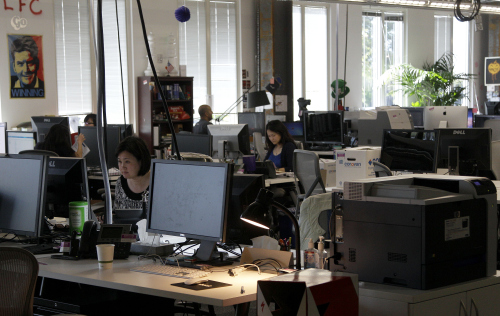 This May 11, 2012, photo shows workers at the Facebook office in Menlo Park, Calif. (AP)
