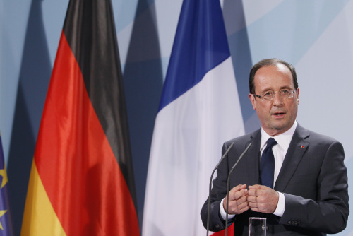 Francois Hollande, France’s president, speaks during a news conference following the Franco-German summit at the German Chancellory in Berlin on Tuesday. (Bloomberg)