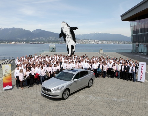 Owners of Kia Motors dealerships from about 100 countries pose during their annual gathering at a hotel in Vancouver on Thursday. (Kia Motors)