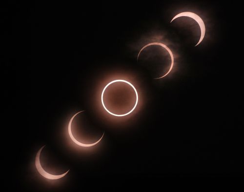 This combination picture shows a solar eclipse seen from Tokyo on Monday. (AFP-Yonhap News)