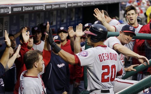Washington Nationals shortstop Ian Desmond celebrates with teammates after hitting a home run in the second inning on Monday. (AP-Yonhap News)