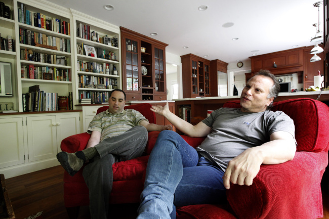 Buzz Bissinger (right) is the author of “Father’s Day,” that talks about his relationship with his son Zach, whom he sits with at home in Chestnut Hill, on May 7. (Philadelphia Inquirer/MCT)