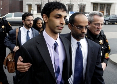 Dharun Ravi, center, and his father, Ravi Pazhani, leave court in New Brunswick, N.J. Dharun Ravi on Tuesday, May 29, 2012. (AP)