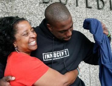 Brian Banks (left) celebrates with his mother Leornia Myers outside court after his rape conviction was dismissed last Thursday. (AP)