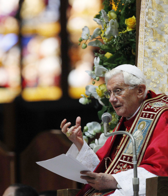 Pope Benedict XVI delivers his speech as he attends a meeting with priests and the religious at the Duomo gothic cathedral, in Milan on Saturday. (AP-Yonhap News)