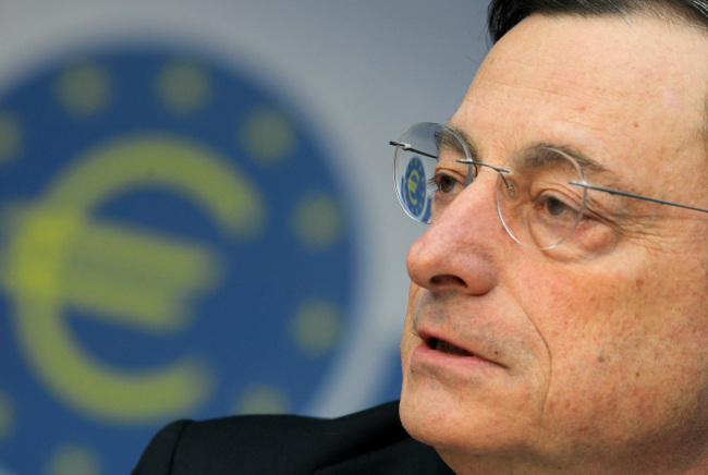 Mario Draghi, president of the European Central Bank, speaks during a news conference in Frankfurt on Wednesday. (Bloomberg)