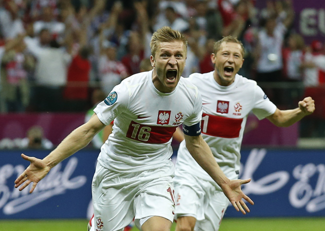 Poland’s Jakub Blaszczykowski celebrates his goal on Tuesday. (AP-Yonhap News)