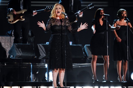 Adele took off two layers before stepping onto the stage to bedazzle the audience with her hit single, 