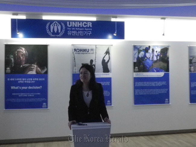 Anne Mary Campbell, a representative of UNHCR Korea, delivers her congratulatory speech at its exhibition on refugees at the Yeosu Expo on Sunday. (UNHCR Korea)
