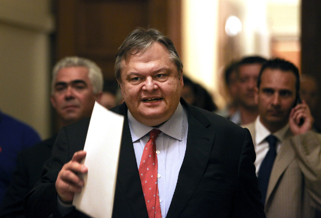 Evangelos Venizelos, leader of Pasok, arrives for a meeting at the Greek parliament to discuss the formation of a new government in Athens on Monday. (Bloomberg)