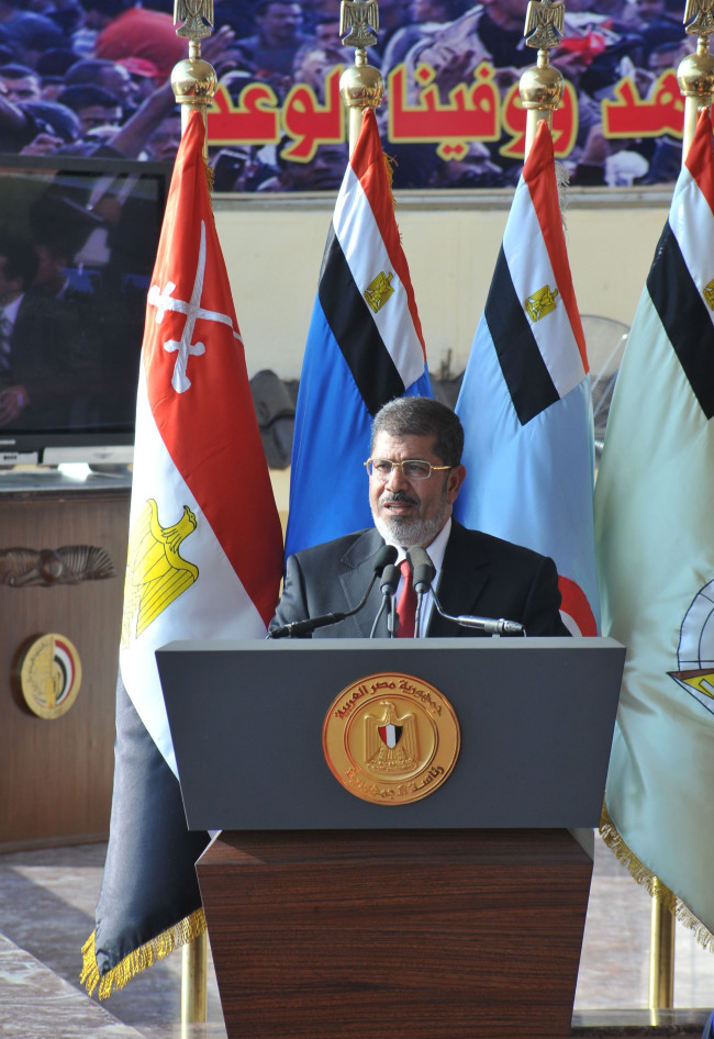 Egypt’s new President Mohamed Morsi speaks during parade at a military base in an eastern suburb of Cairo on Saturday. (Xinhua-Yonhap News)