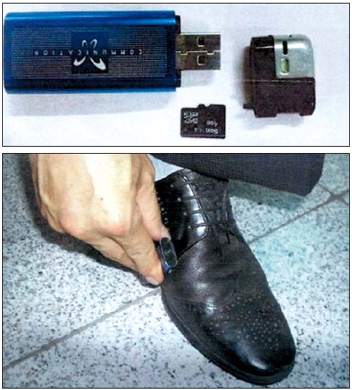 Police in Gimhae, South Gyeongsang Province, confiscated on Monday video recorders installed in a lighter (top photo) and a shoe from a man, who used them to secretly photograph women.(Yonhap News)