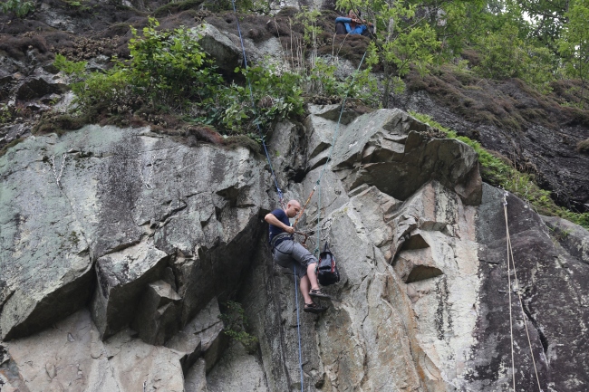 A climber works on a climbing fixture. (KOTRi)