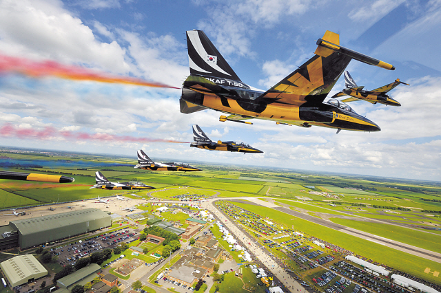 The Air Force’s Black Eagles aerobatics team fly the T-50 advanced trainer jets in formation at the Waddington International Air Show in the U.K. on July 1. (Air Force)