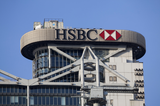 The HSBC logo is displayed on top of the company’s headquarters in Hong Kong, China, Thursday. (Bloomberg)