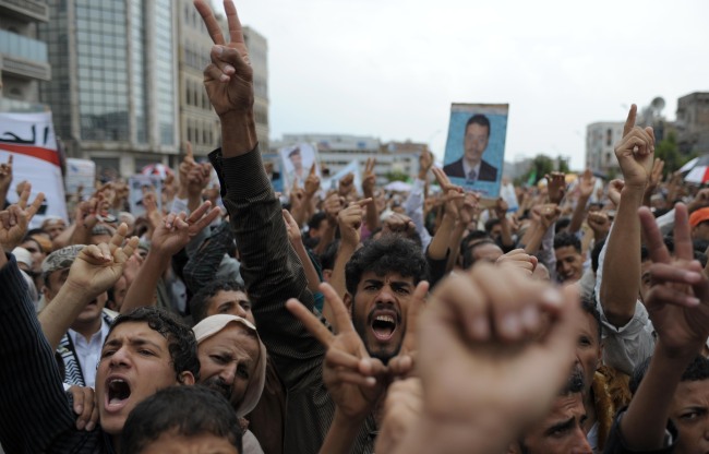 Yemenis shout slogans during a protest in the capital of Sanaa. (Xinhua-Yonhap News)